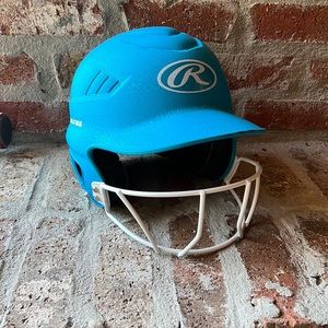 Girls softball bat and helmet